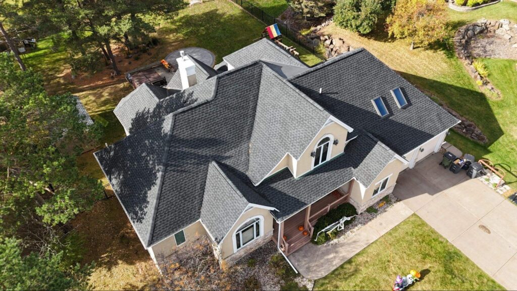 Aerial drone view of a home's asphalt shingle roof in Two Harbors, MN.
