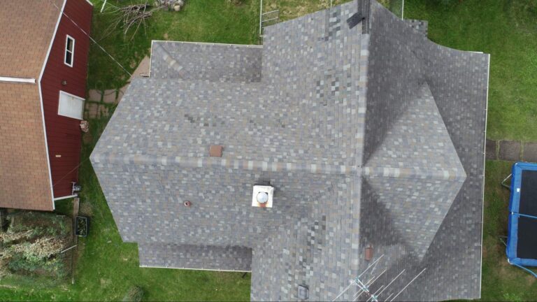 Aerial view of an asphalt shingle roof on a northern Minnesota home by Empire Roofing